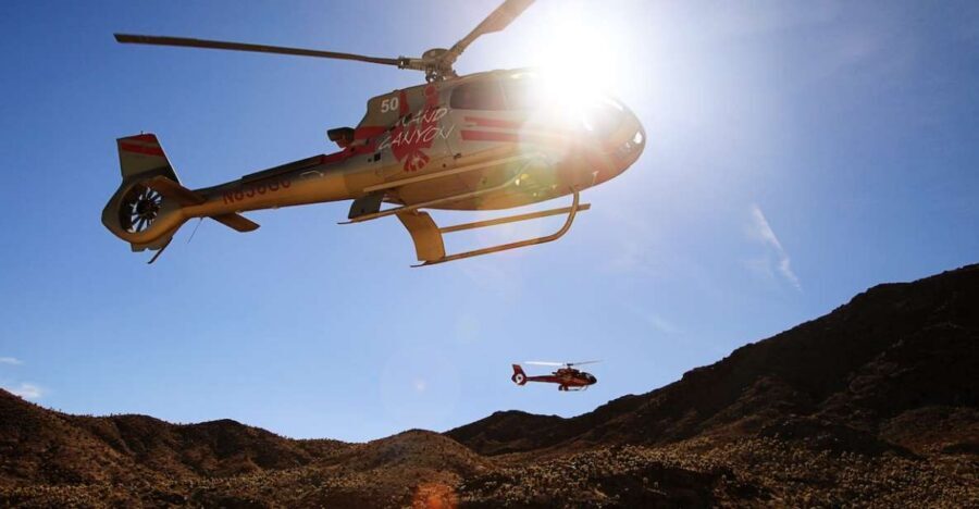 Grand Canyon Helicopter Landing Tour with Vegas Strip - Dropping 3,200 feet: landing near the Colorado River